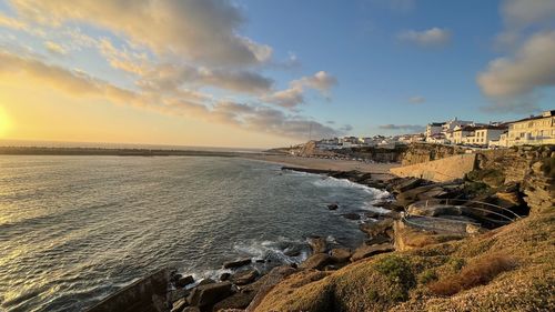 Panoramic view of sea against sky during sunset