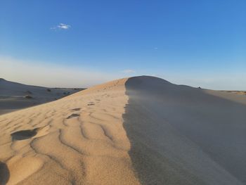 Sand dunes with clear sky