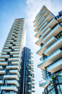 Low angle view of modern buildings against sky