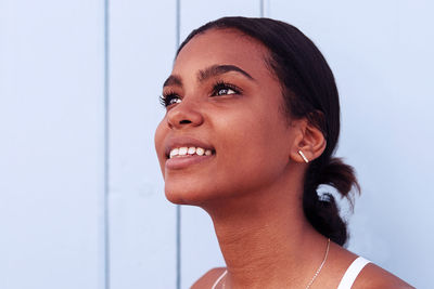 Portrait of young woman looking away