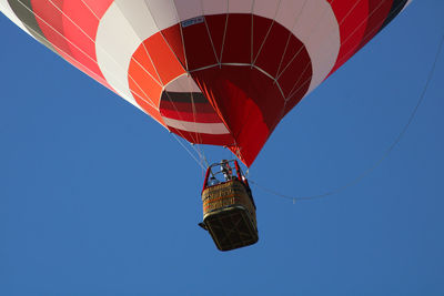 Low angle view of hot air balloon against clear sky