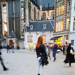 People walking on city street