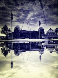 Reflection of cloudy sky in water