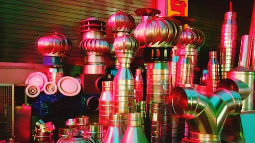 Close-up of illuminated lanterns hanging at store