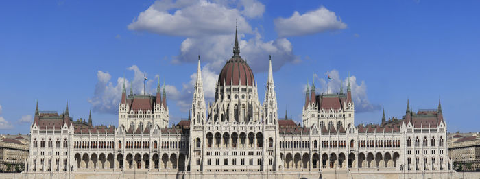 Low angle view of buildings in city against sky