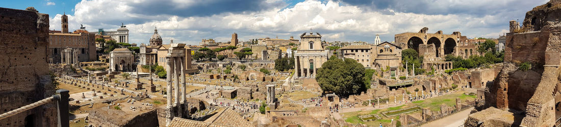 Panoramic view of old building against cloudy sky