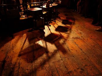 High angle view of shadow on floor at night