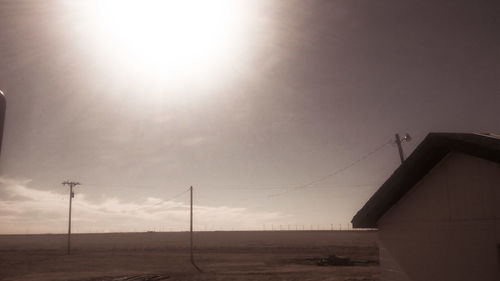 Windmills against sky