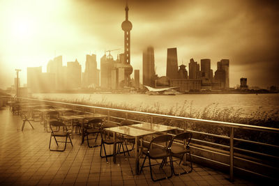 Panoramic view of buildings against sky during sunset