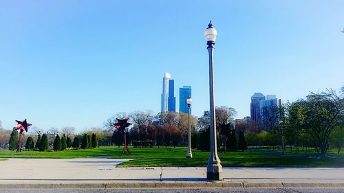 View of park against clear blue sky