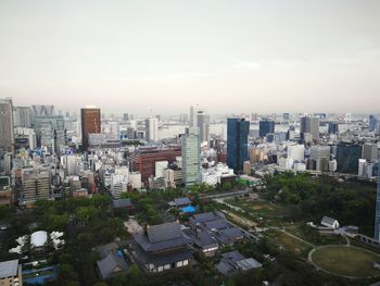 High angle view of buildings in city against sky