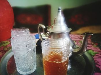 Close-up of beer glass on table