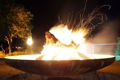 Close-up of fire pit at night