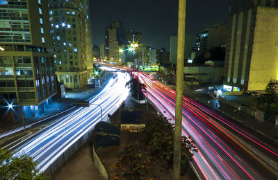 Traffic on city street at night