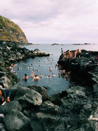 Scenic view of sea against cloudy sky