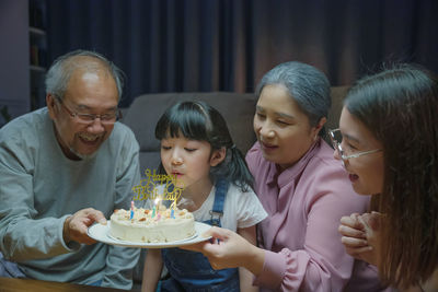 Portrait of family sitting at home