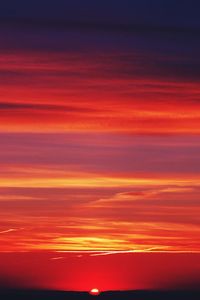 Scenic view of dramatic sky during sunset