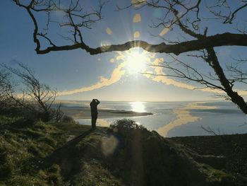 Silhouette of man on sunny day