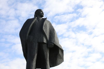 Low angle view of statue against sky