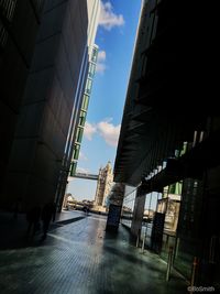 Street amidst buildings against sky