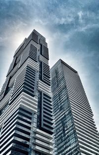 Low angle view of modern buildings against sky