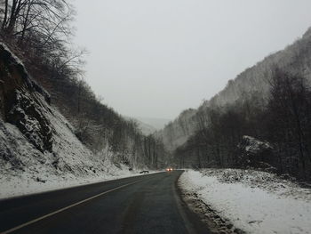 Country road passing through landscape