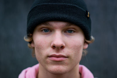 Close-up portrait of boy wearing hat