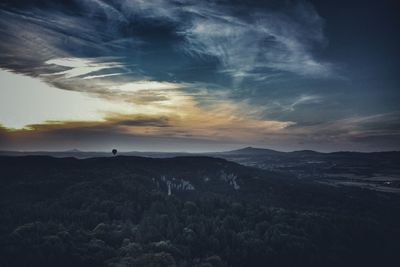 Scenic view of silhouette landscape against sky during sunset