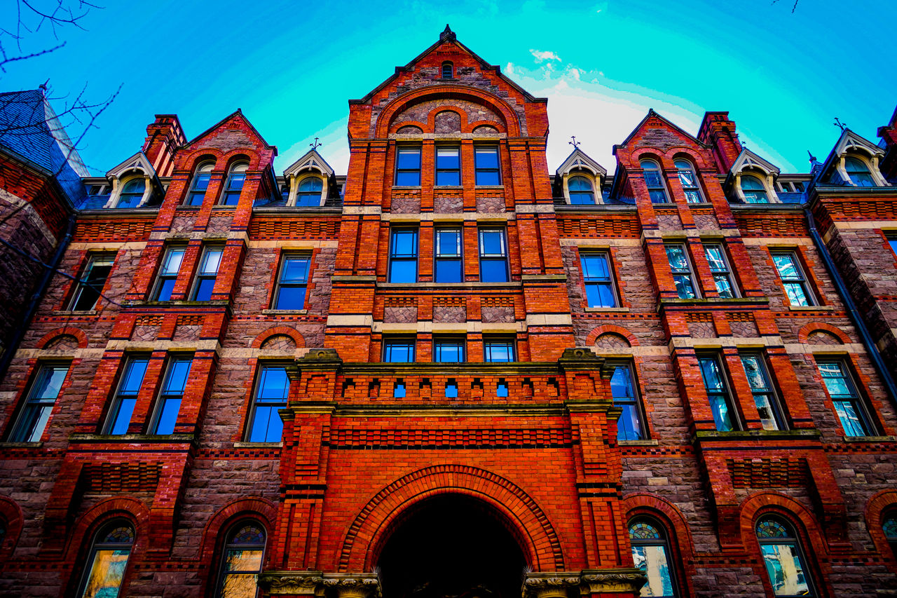 architecture, built structure, building exterior, landmark, building, low angle view, sky, arch, facade, window, travel destinations, city, history, no people, the past, cityscape, day, nature, blue, urban area, outdoors, clear sky, town, travel, tourism, religion, house