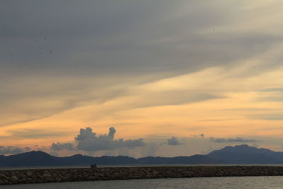 Scenic view of silhouette landscape against sky during sunset