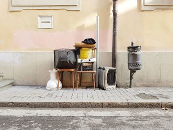 Abandoned objects against wall