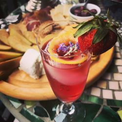 Close-up of cocktail in glass on table