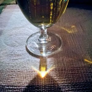 Close-up of wineglass on table