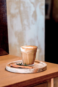 Coffee cup on table in cafe