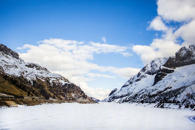 Scenic view of snowcapped mountains against sky