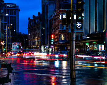 Traffic on road in city at night