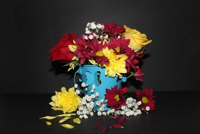 Close-up of flowers against black background