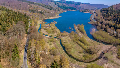 High angle view of lake amidst trees