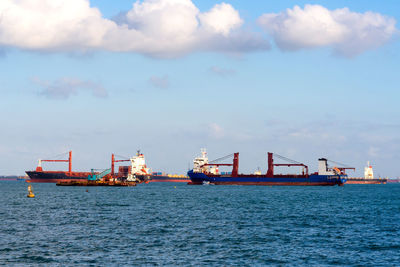 Ship in sea against sky