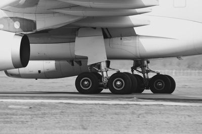 View of airplane at airport runway