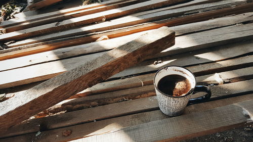 High angle view of coffee cup on table