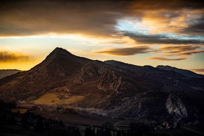 Scenic view of mountains against sky during sunset