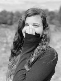 Portrait of smiling young woman