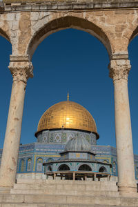 Temple mount against clear blue sky