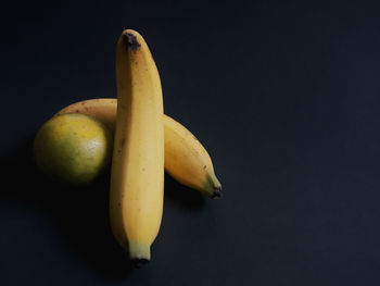 Close-up of bananas against black background