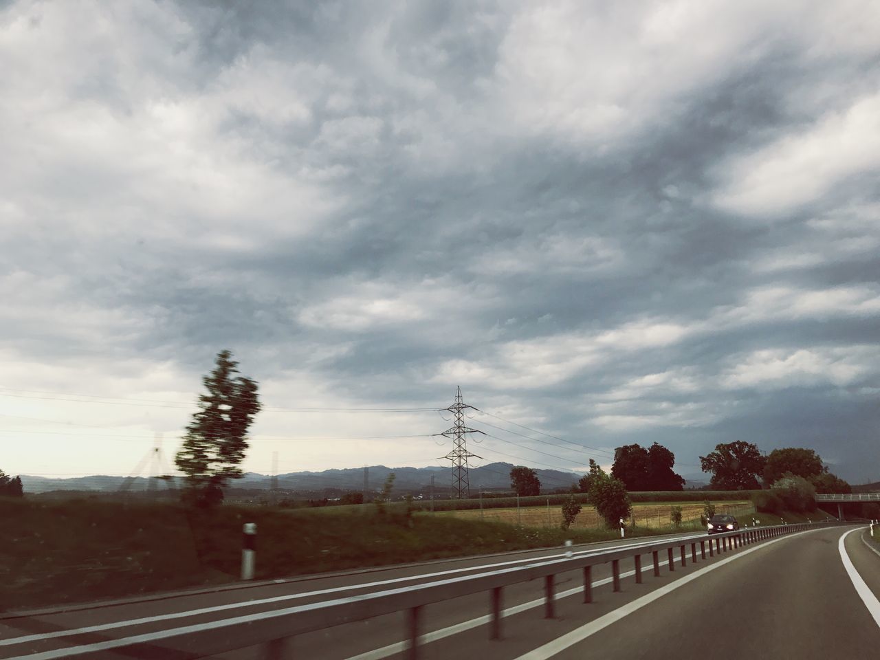 EMPTY ROAD AGAINST SKY