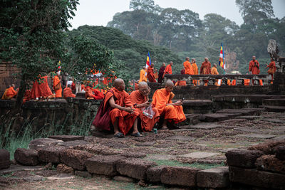 Statue outside temple against building