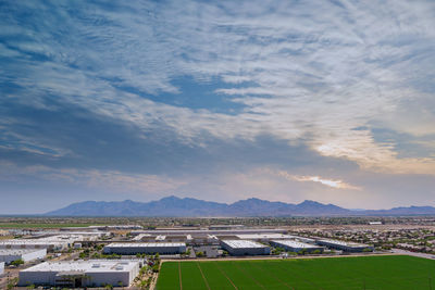 High angle view of buildings in city against sky