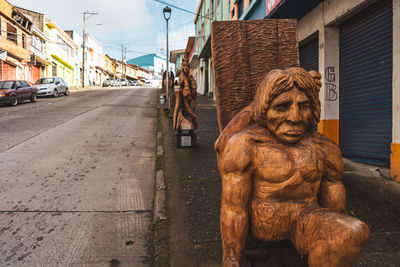 Mythical wooden statues in the streets of castro on chiloe