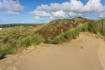 Scenic view of land against sky